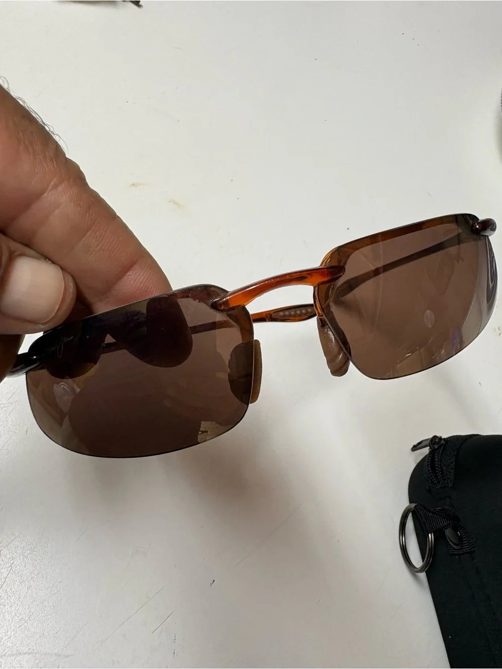 Please see the pictures one of the lenses little small piece missing,